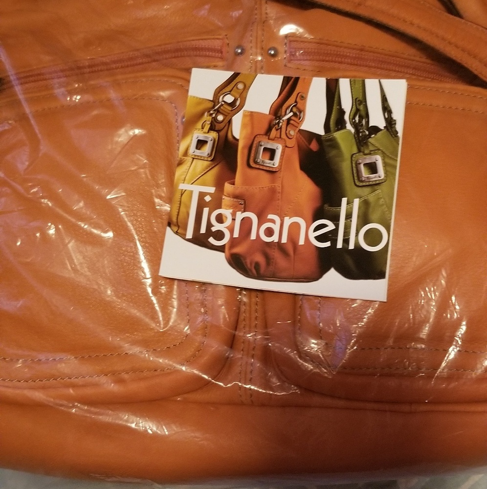 NWT Orange genuine leather bag